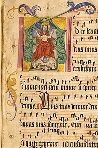 Bild von Jesus mit Heiligenschein und roten Mantel in einem alten Buch mit Noten