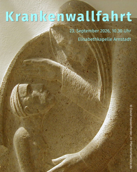Steinrelief zeigt eine Person, die eine andere fürsorglich berührt. 